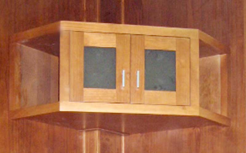 Mueble para televisión rinconero en tono miel
